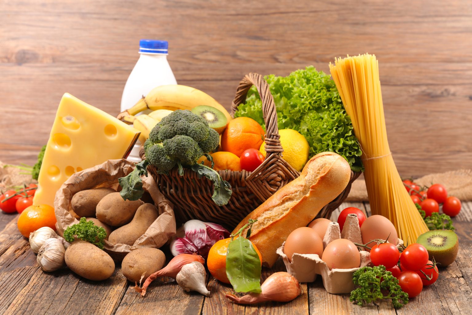 Variety of foods representing all macronutrients including carbs, proteins and fats