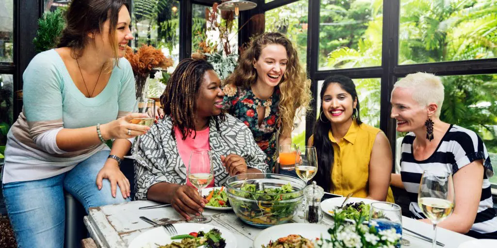 women enjoying conversation with their friends while discussing their nutrition and health